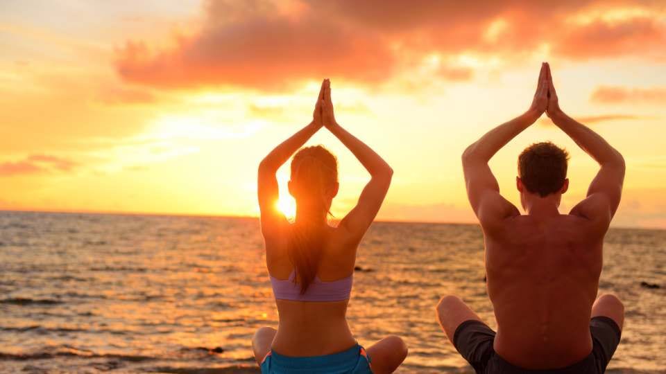 Couples Yoga Poses / Canva