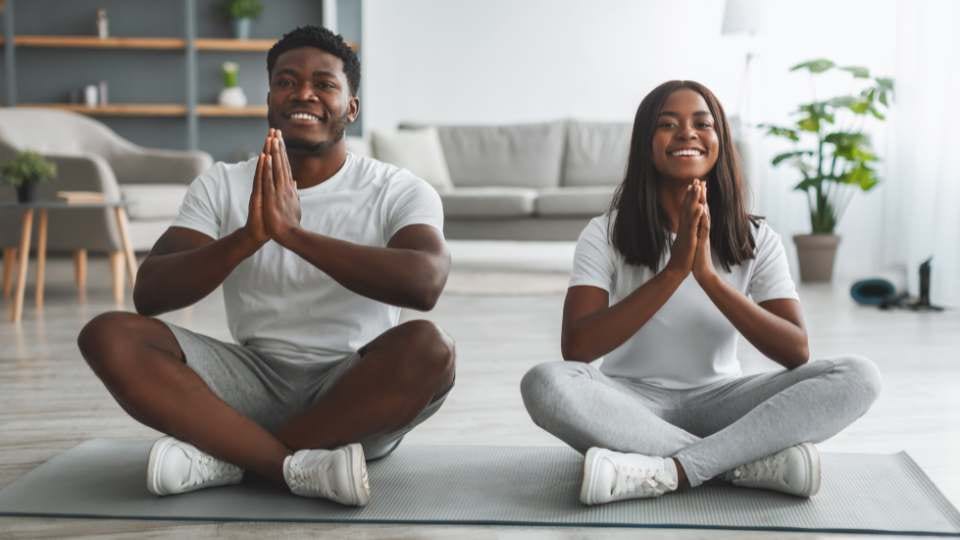 Reduced Anxiety and Stress through Couples Yoga / Canva