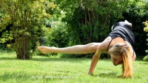 Side Crow Pose (Parsva Bakasana) / Canva