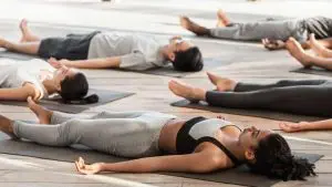 Preparing The Body And Mind For Bedtime Yoga / Canva