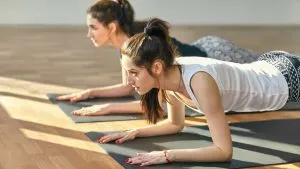 Yoga Dolphin Plank Pose / Canva
