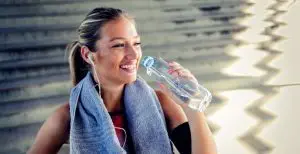 Hydration and Towels in Hot Yoga / Canva